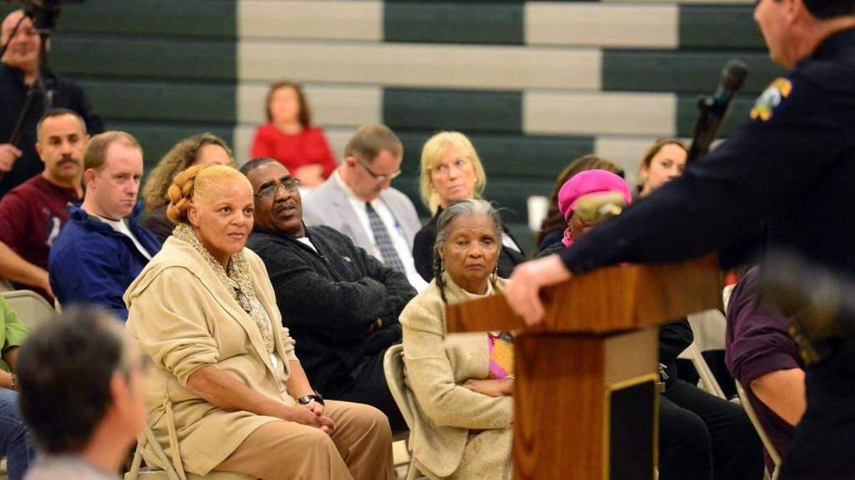 Merced residents at a town hall-style meeting at Rivera Middle School last year listen to Merced police Chief Norm Andrade speak.