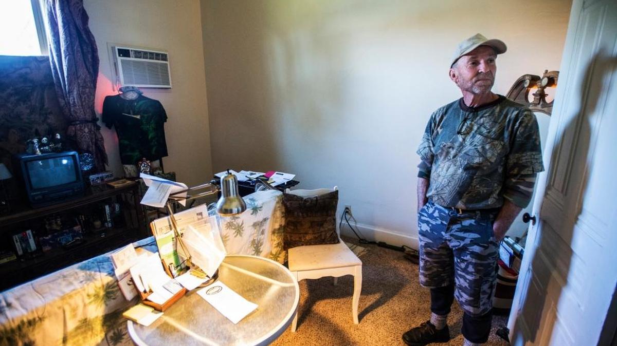 U.S. military veteran Ken Roark, 54, stands in his bedroom after he acquired housing in Merced through the Sierra Saving Grace Homeless Project in March. He is now in housing in Gilroy, according to Sierra.