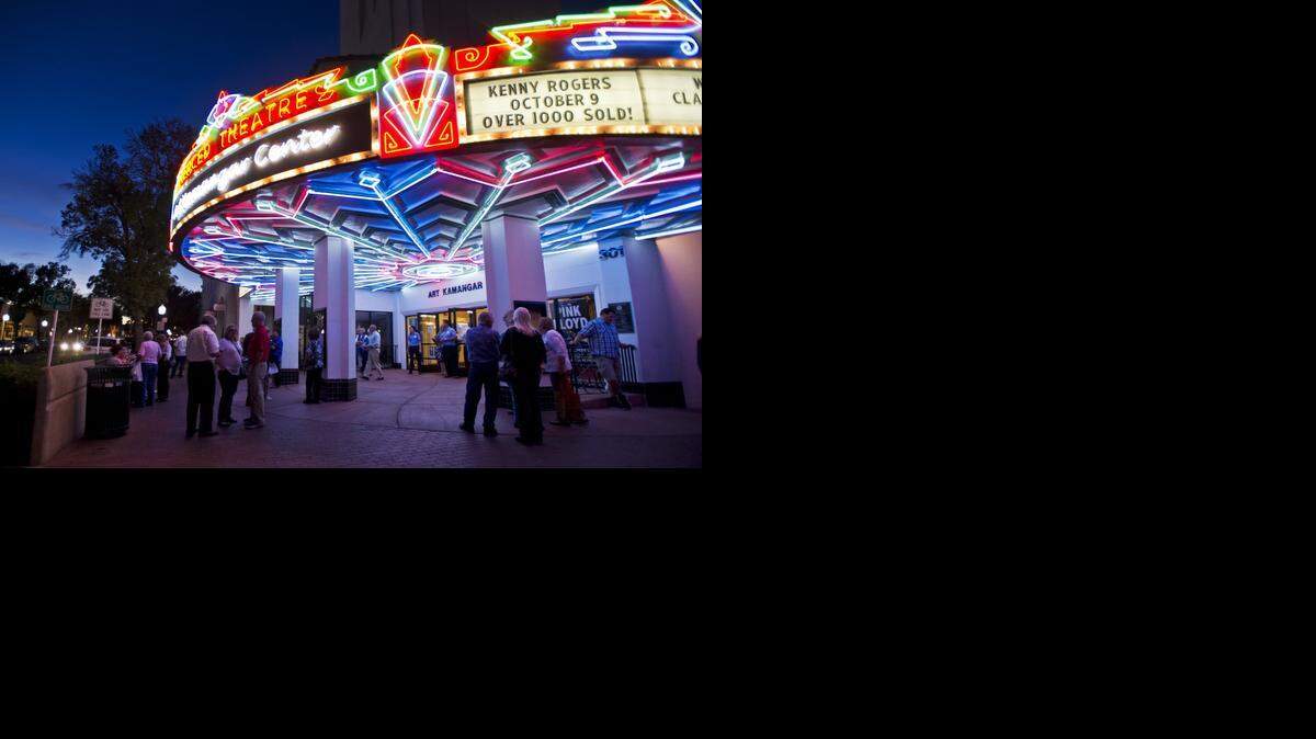 
Kenny Rogers fans enter the Merced Theatre prior to the singer-songwriter’s performance during his Through the Years World Tour in Merced, Calif., Thursday, Oct. 9, 2014.
