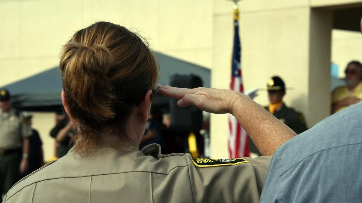 
Lt. Lilly Dawson salutes the flag during a ceremony celebrating the Central California Women’s Facility 25th anniversary on Thursday. 
