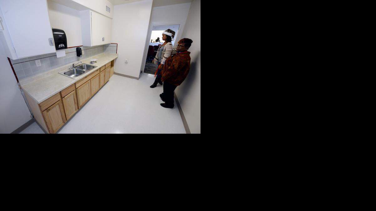 
Rachelle Abril, right, and Kelly Turner talk about the upgrades to the kitchen inside the McNamara Park Youth Center. The city of Merced paid for work inside the building, but  a group of nonprofits will run the center on its own dime.
