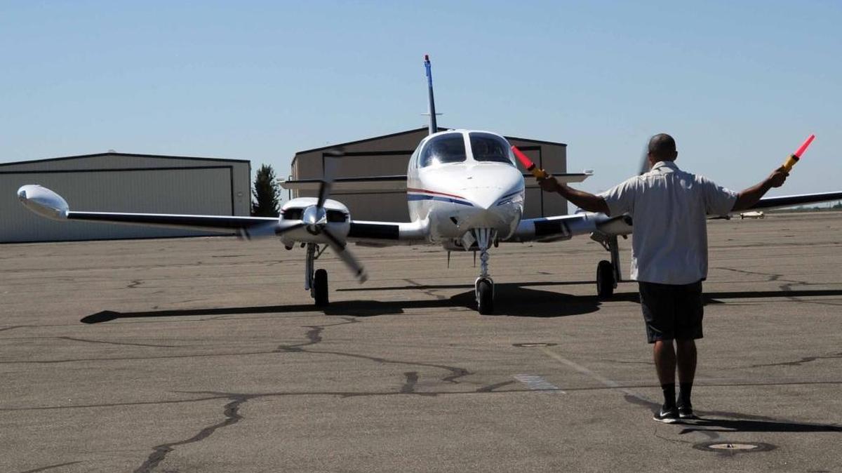 
A small plane flies into the Merced Municipal Airport in 2012. 
