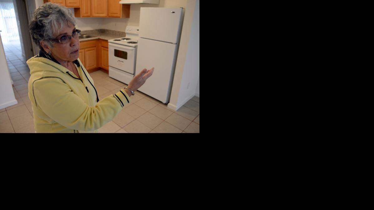 
Construction coordinator Renee Davenport talks about upgrades to the Sunrise Apartments in Winton while standing in one of the refurbished rooms Friday. A new owner is paying for the upgrades and will start renting the improved residences in January.

