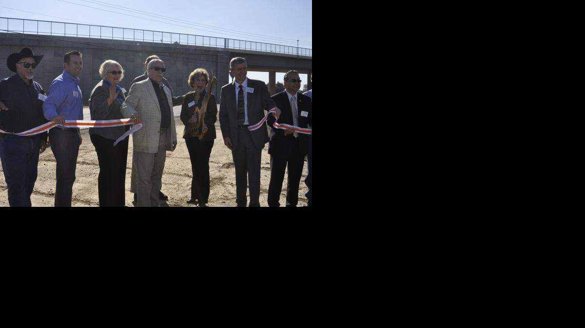 
Supervisor John Pedrozo, Merced Councilman Mike Murphy, Louise Farley, Supervisor Hub Walsh, Merced Mayor Stan Thurston, Kathleen Crookham, Caltrans Director Malcolm Dougherty and Caltrans District 10 Director Dennis T. Agar are shown during Friday’s ribbon-cutting ceremony for the $41 million Bradley Overhead project.

