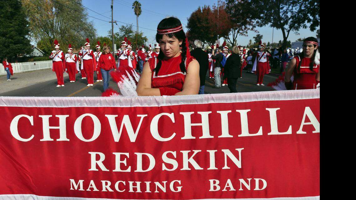 Members of the Chowchilla High School Marching Band display their “Redskin” banner in 2009. Chowchilla would have to stop using Redskins if the Legislature approves a ban of the name.