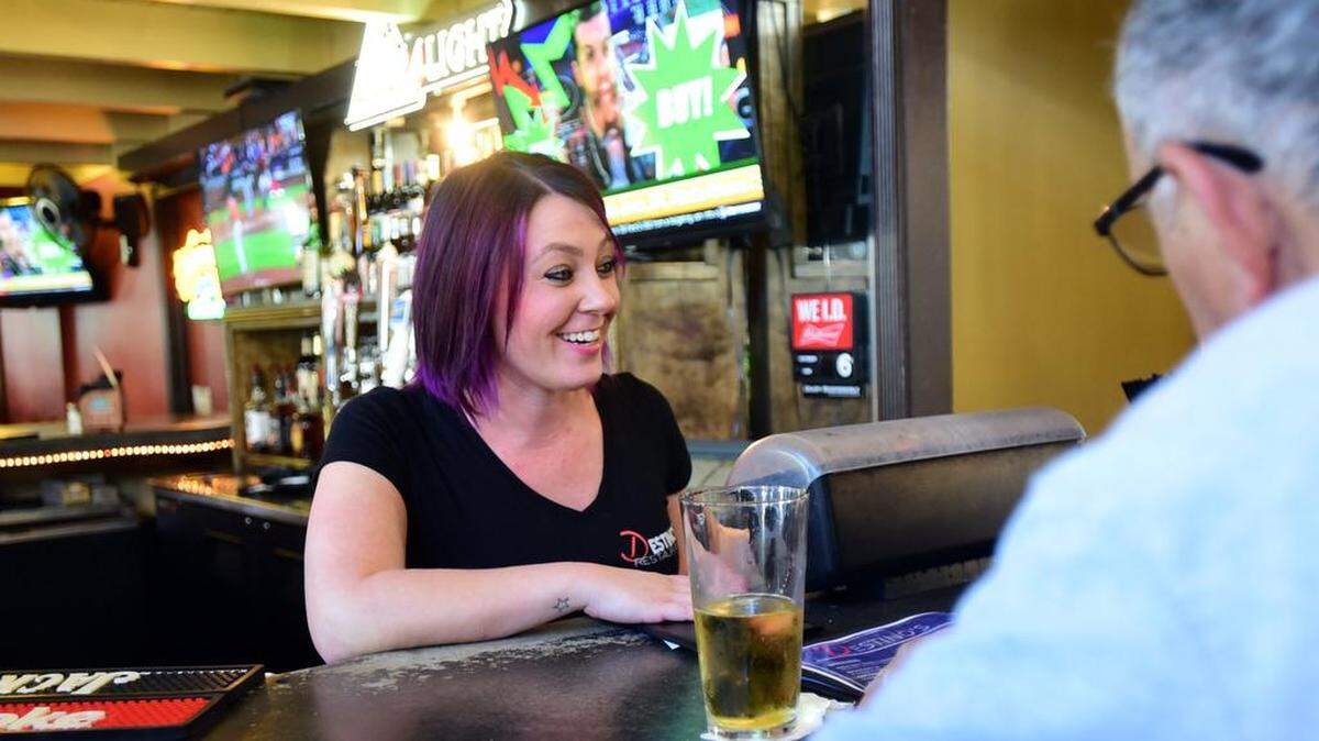 Owner Tessa Palmer talks to customers inside Destino's, a restaurant that replaced Pinocchio's, in downtown Merced on Friday, Oct. 6, 2017.