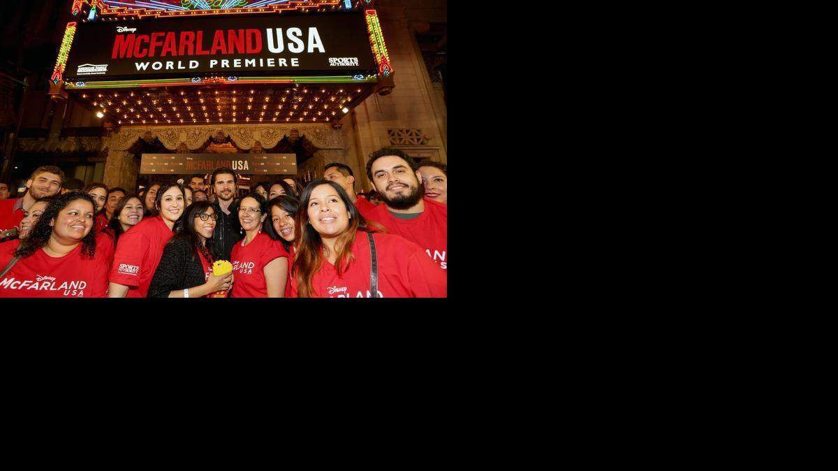 
HOLLYWOOD, CA - FEBRUARY 09: Musician Juanes with fans at the world premiere of "McFarland, USA" at The El Capitan Theatre on February 9, 2015 in Hollywood, California. (Photo by Jesse Grant/Getty Images for Disney). 
