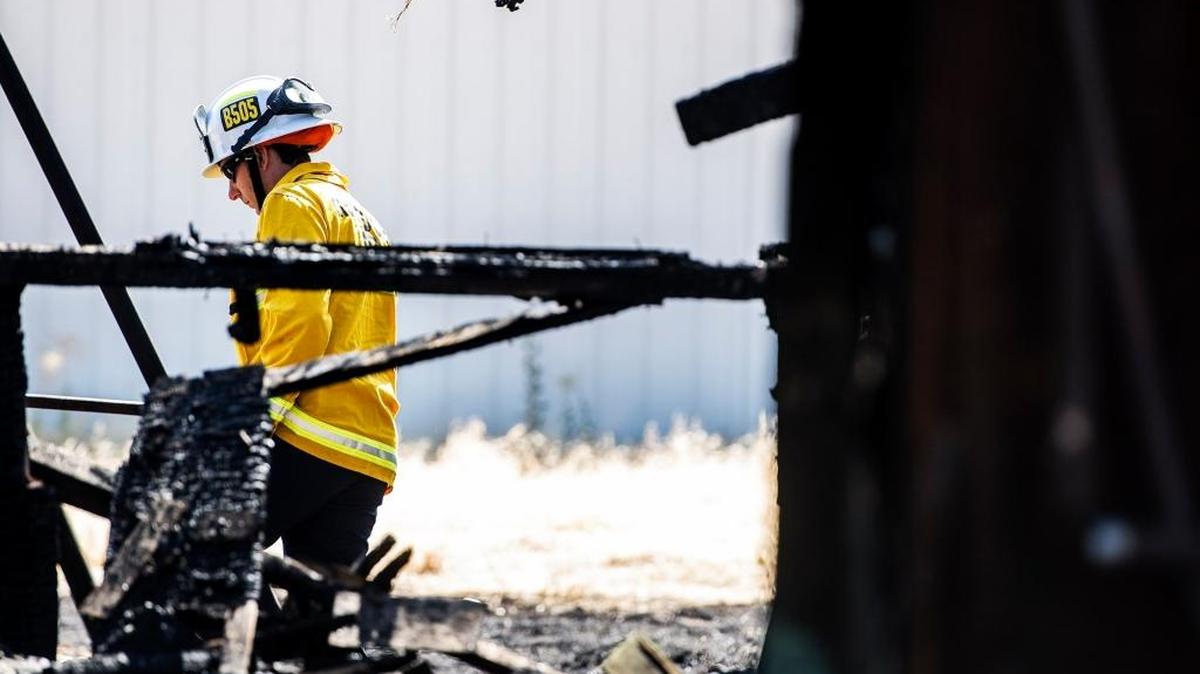 Merced Fire Department Battalion Chief Mark Walker inspects the scene of a vacant structure that caught fire at 861 West 14th Street in Merced in 2015. The Merced City Council will take up the fees for fire inspections, and a number of other topics, during a meeting at 7 p.m. Tuesday.
