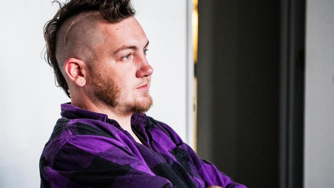 Garrett Mayer, 25, discusses his concerns about new city ordinances that ban medical marijuana sales and deliveries. In 2012, he was diagnosed with a brain tumor. Medical cannabis helps him control seizures, he says.