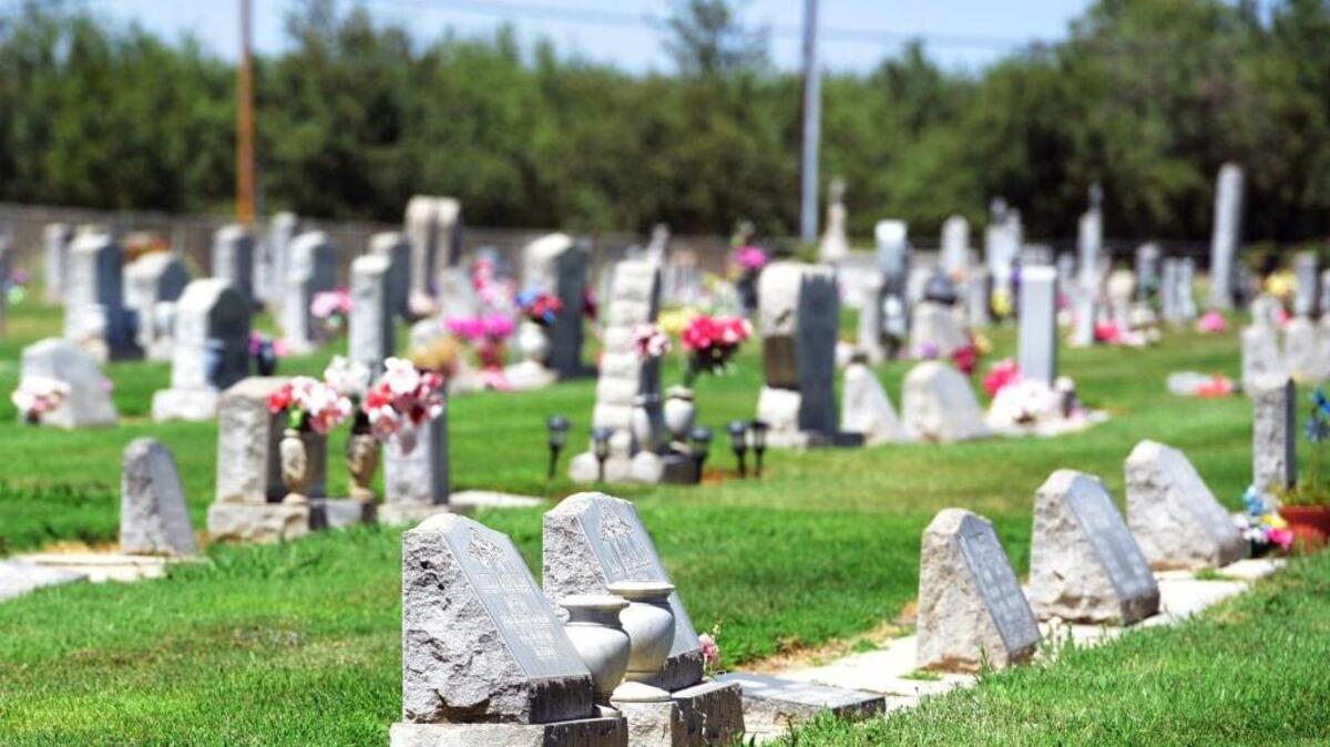 The sun shines on headstones at the Winton Cemetery on Monday, Aug. 14, 2017. A Manteca woman claims a 500-pound headstone there fell on her and crushed her right leg in August 2015.