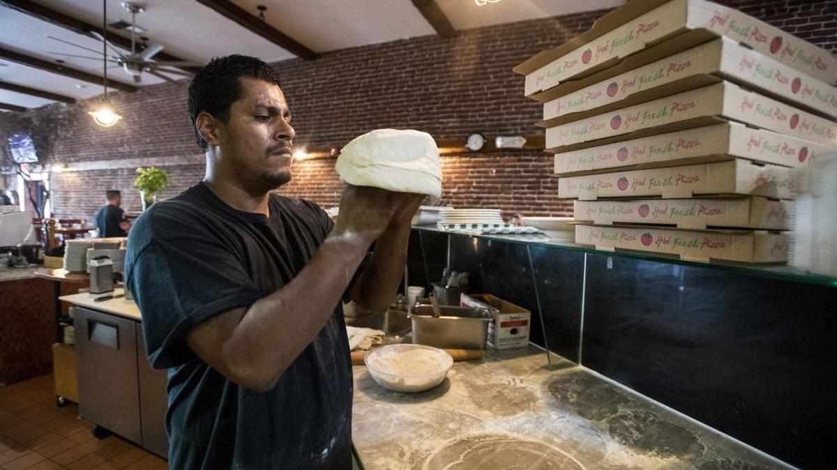 Bella Luna Bistro pizza chef, Vincent Garcia, 32, of Merced, prepares pizza dough during the restaurant’s dinner hours in Merced, Calif., on Thursday, May 4, 2017. According to restaurant owner Vinnie DeAngelo, the building has been listed for sale.