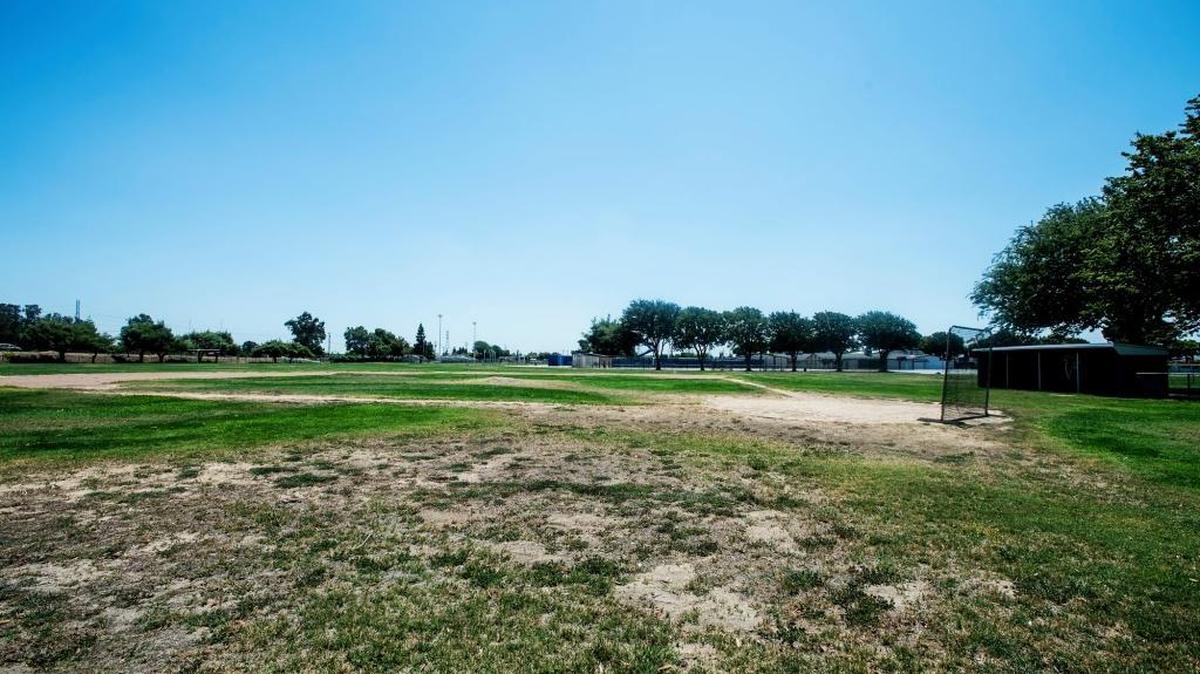 
A dry varsity baseball field is shown at Atwater High School in Atwater in August. An Atwater High School official updated the City Council on Monday on the school’s efforts to conserve water despite being allowed to sprinkle five days a week. 
