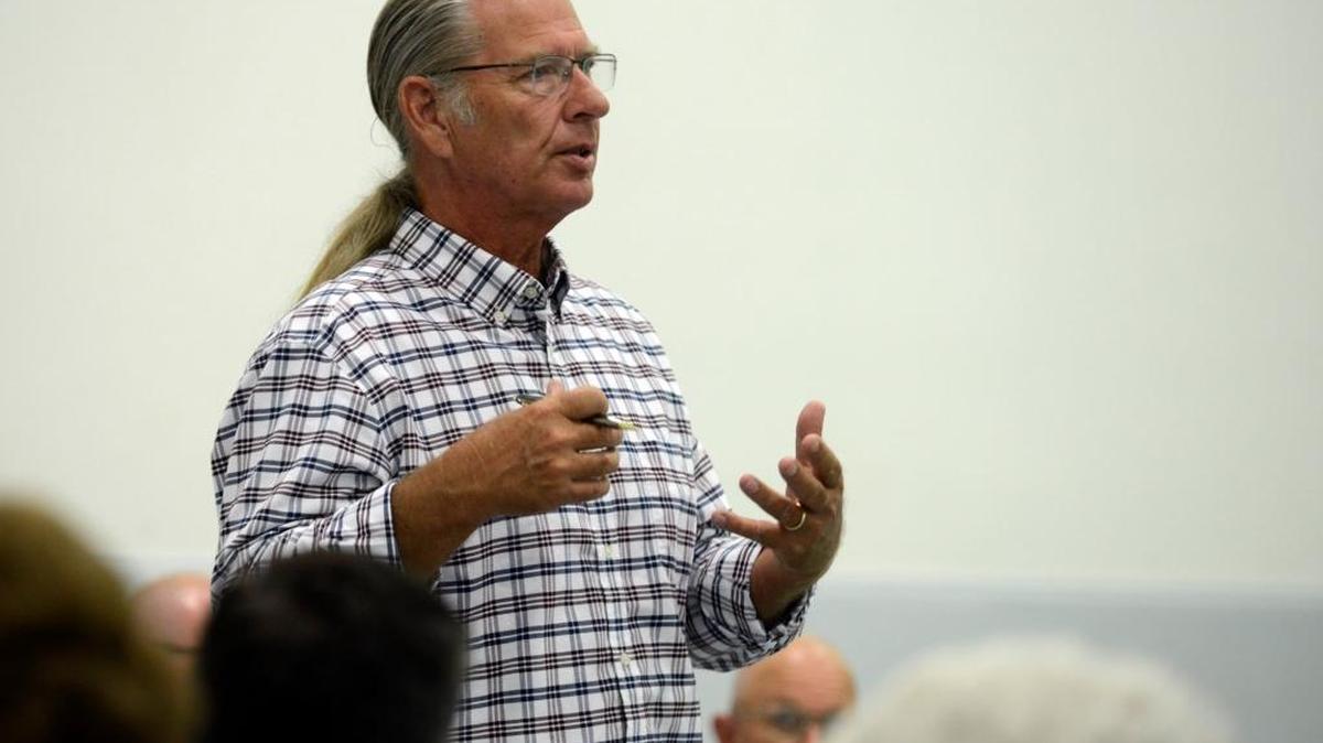 Atwater Mayor Jim Price speaks to several dozen people during a town hall meeting last year at the Community Center. The discussion topics ranged from water to taxes, and to economic development.