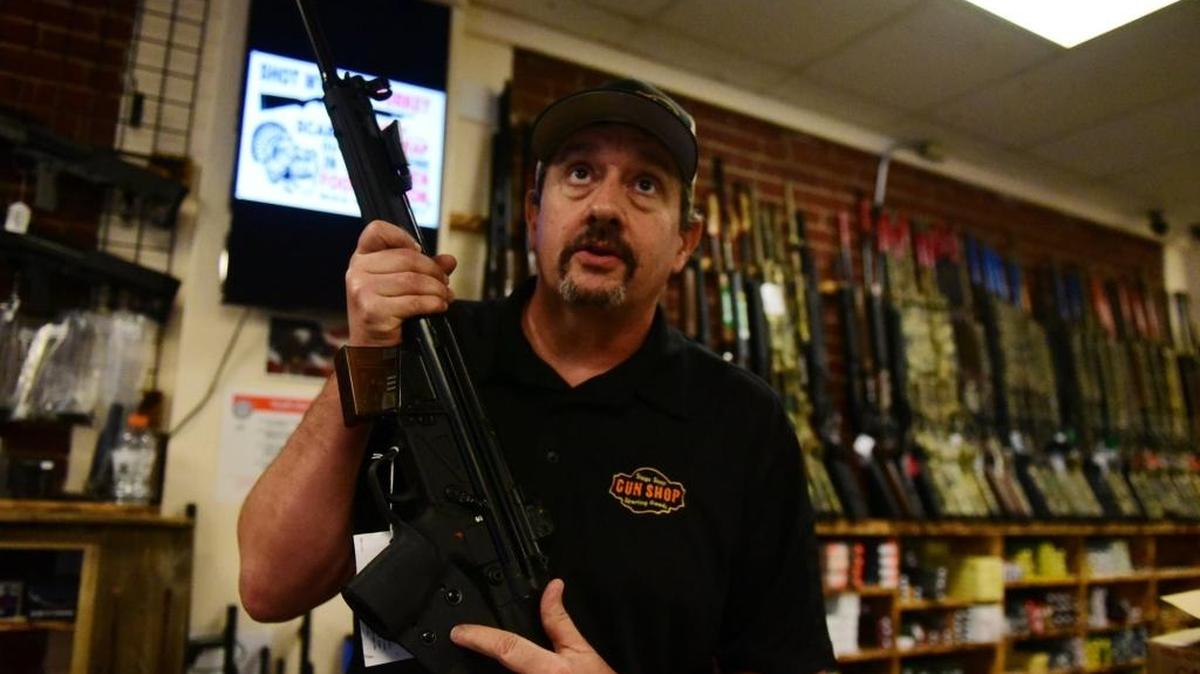 Atwater’s Stage Stop Gun Shop owner Joey Verna talks on Tuesday, Jan. 3, 2017, about new gun and ammunition laws that have driven an increase in sales in the past month. He said he’s sold five times the amount of guns and ammo in the past month than in a typical month.