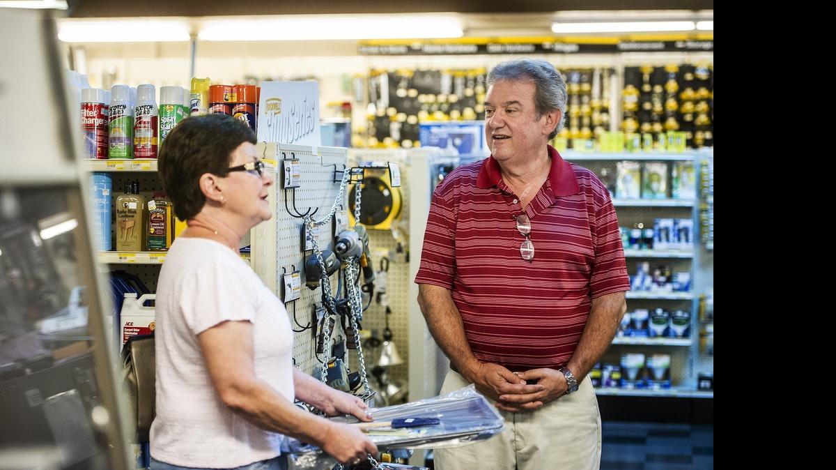 
Passadori’s co-owner Jim Passadori, 59, right, speaks with customer and Atwater resident Kathy Jansen, 65, left, at Passadori’s, an appliance and hardware store in Atwater on Friday. The nearly 100-year-old business will be closing its hardware section at the end of business hours Friday, and an auction of the remaining hardware merchandise will be held at the store Aug 1. “I’m very saddened by the store being closed. This is just a part of Atwater history,” Jansen said.
