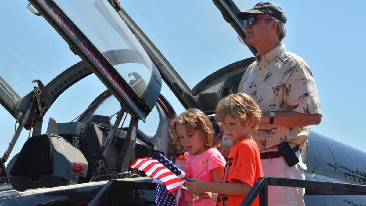 Vacaville residents Kira Thomas, 7, Kyle Thomas, 8, and their father, Mark Thomas, check out a T-38 Talon used for training purposes during Open Cockpit Day at Castle Air Museum in Atwater on Sunday, May 29, 2016.