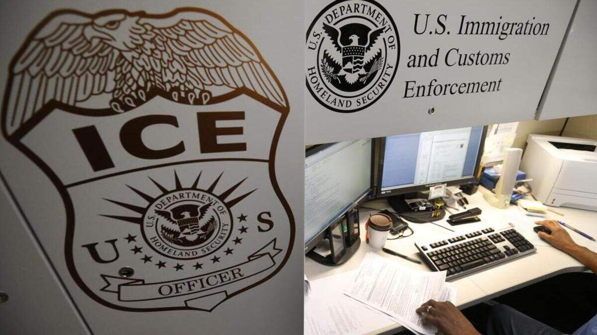 An unidentified Immigration and Customs Enforcement deportation officer reviews forms required to issue a detainer asking local law enforcement to hold someone until ICE agents can pick the person up, at the the Pacific Enforcement Response Center in Laguna Niguel, Calif., on April 26, 2017.