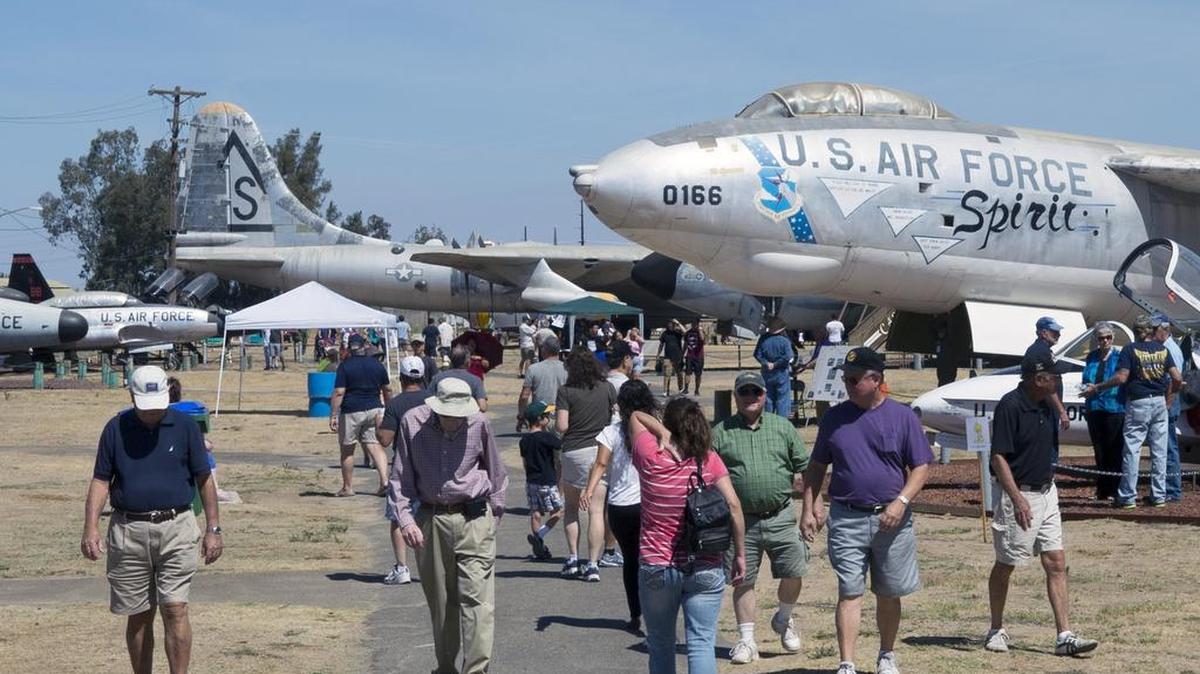 
Visitors walk among the many different planes Sunday during Open Cockpit Day at Castle Air Museum in Atwater.
