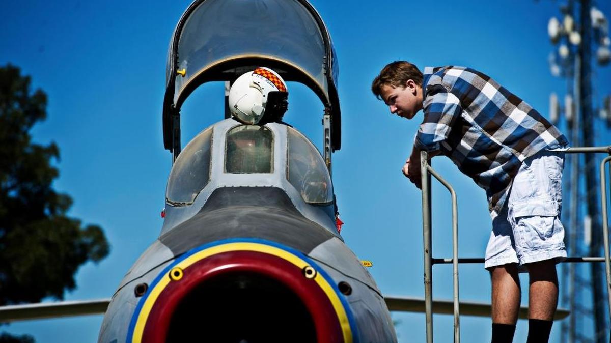 
James Idle of Granite Bay looks into the cockpit of a fighter jet during Open Cockpit Day at Castle Air Museum in Atwater last year. “It’s pretty nice to actually see inside,” Idle said. 
