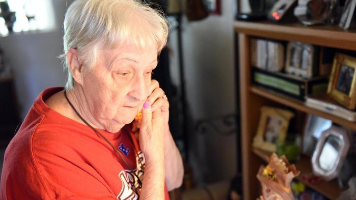 Nadine Walters, 74, of Atwater listens to her phone to see if it’s giving the dial tone on Tuesday, March 29, 2016. The wireless converter for her landline she bought a month ago from AT&T has been a hassle and doesn’t work, she says.