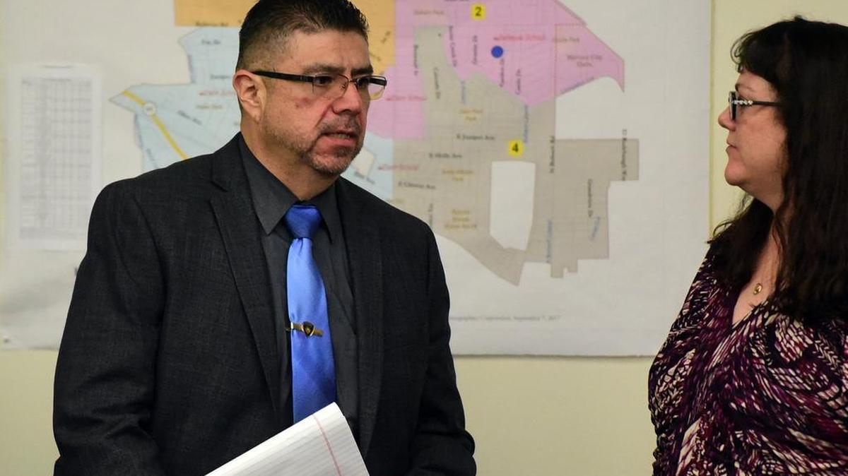 Atwater's Interim Police Chief Armando Echevarria speaks on Monday, April 9, 2018, with Human Resources Director Jeanna Del Real. The City Council voted 4-1 to wave the educational requirement for the chief's position, which requires the top officer to have a bachelor's degree. He has a high school diploma.