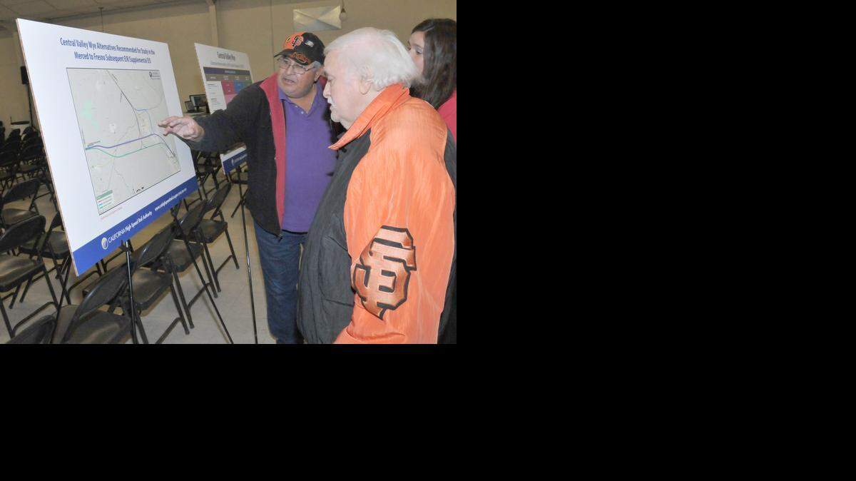 
Joe Sclimenti, left, and Leo Salcedo check out the three alternative routes for the high-speed rail junction that’s planned to go through Chowchilla.
