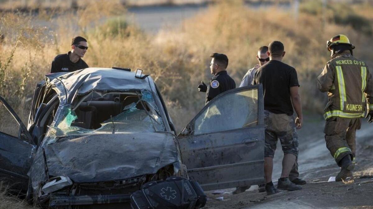 The California Highway Patrol and the California Department of Forestry and Fire Protection, Merced County, respond to the scene of a fatal car crash near the intersection of Buchanan Hollow Road and Silveira Way in Le Grand, Calif., on Wednesday, Sept. 27, 2017. According to CHP, the car was traveling in the northbound lanes of Highway 99 when it left the roadway and rolled coming to a stop along Buchanan Hollow Road.