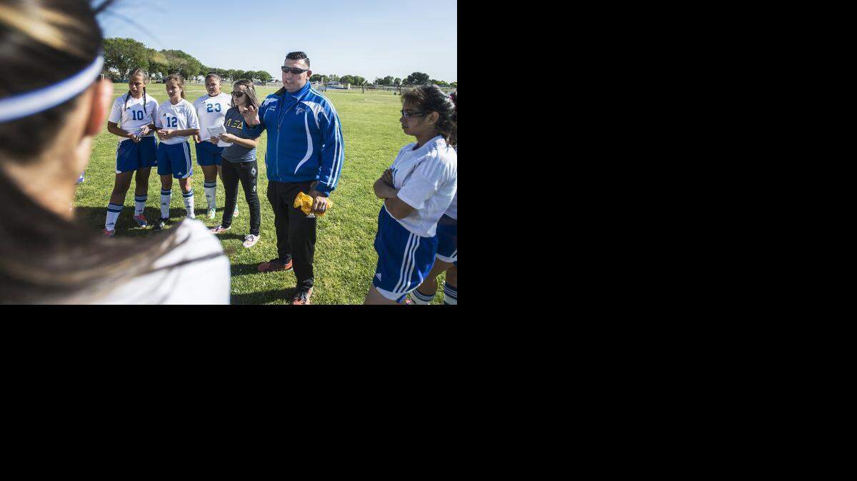 
Juan Perez, 38, of Gilroy coaches the Atwater junior varsity girls’ soccer team at Atwater High School on Thursday. Perez, who also coaches the Buhach Colony varsity boys’ soccer team, also created a soccer program at Yosemite High School.
