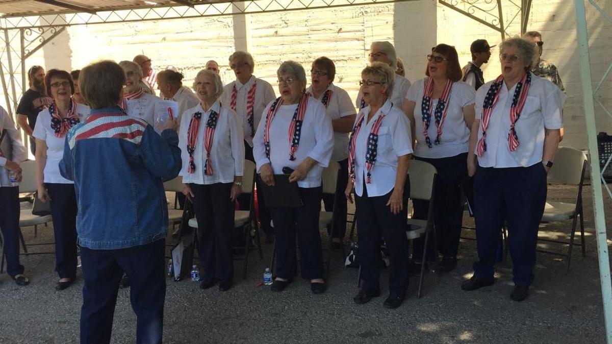 The Sweet Adelines chorus singing a closing song after the Memorial Day ceremony at Merced District Cemetrey on May 30, 2016.