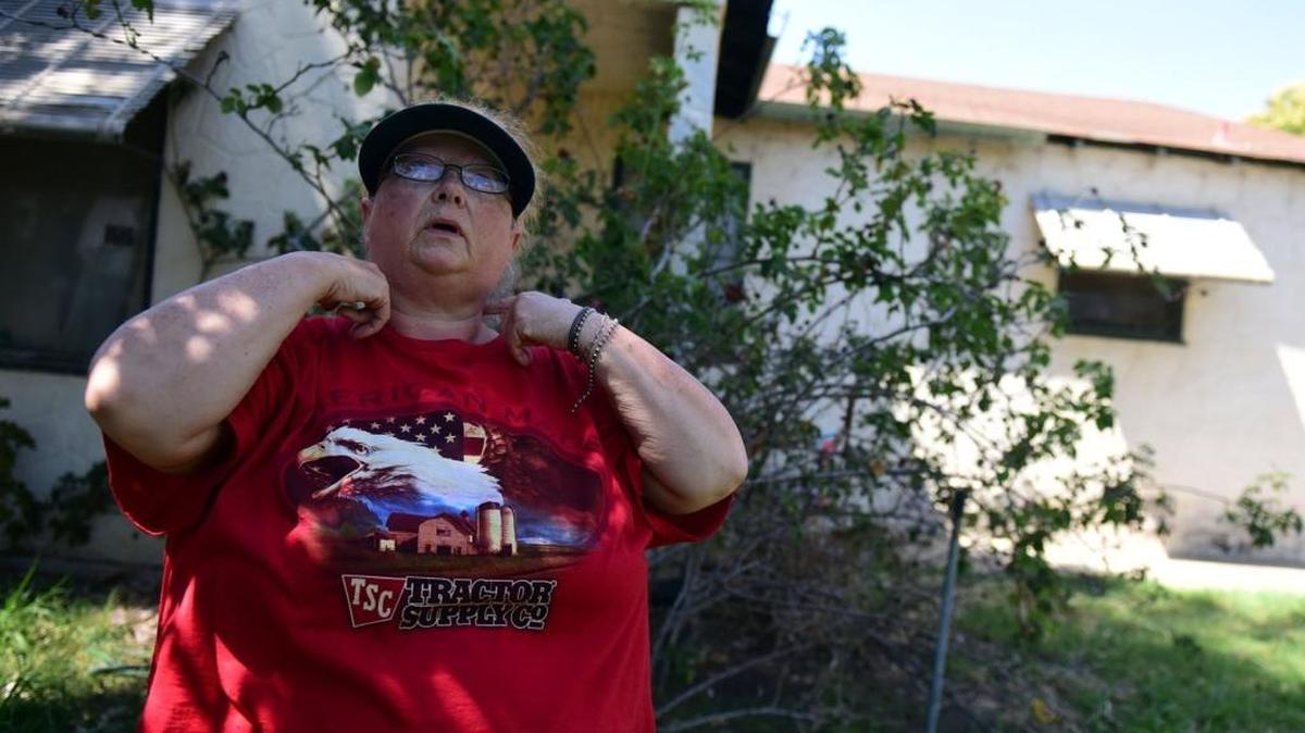 Laura Thornhill, 58, talks Monday, July 3, 2017, about the places her neighbor was mauled by a German shepherd on Stretch Road just outside of Merced. The man had “serious injuries” around his neck eyes, and arms, according to the Merced County Sheriff's Office.