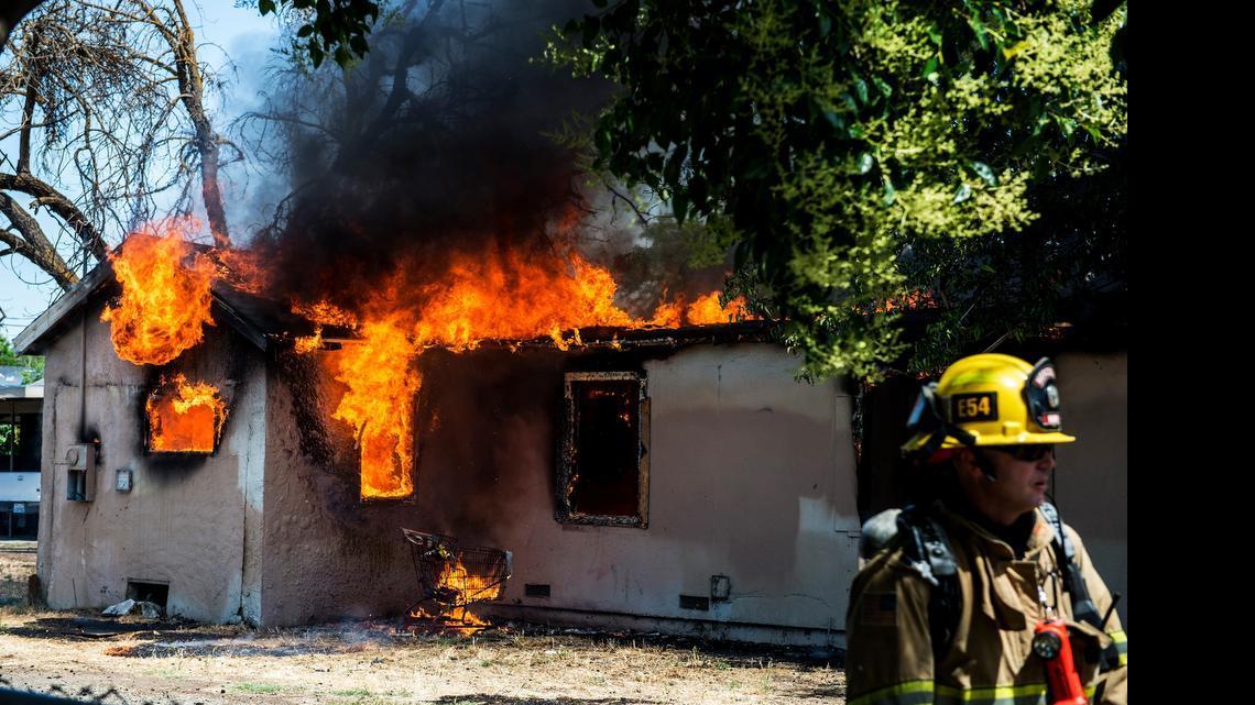 
A vacant house burned down Tuesday after firefighters determined it was safer to defend neighboring homes than it was to save the already-crumbling structure. 
