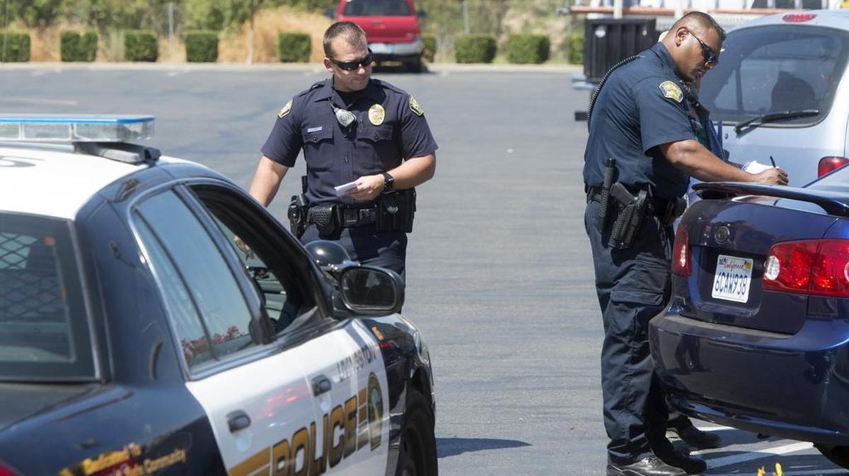 
Livingston police officers investigate a minor parking lot incident Wednesday.
