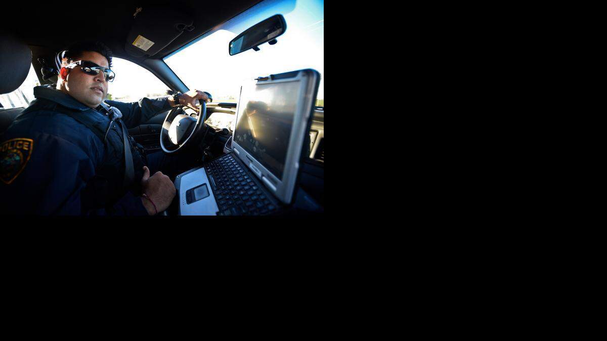 Police Officer Wapinder Kang patrols the streets of Livingston on Wednesday<137>, Dec. 31, 2014<137>. <137>Livingston police officers and supervisors are taking a 5 percent pay cut starting Jan. 1 as the city attempts to balance a $140,000 budget deficit.<137>