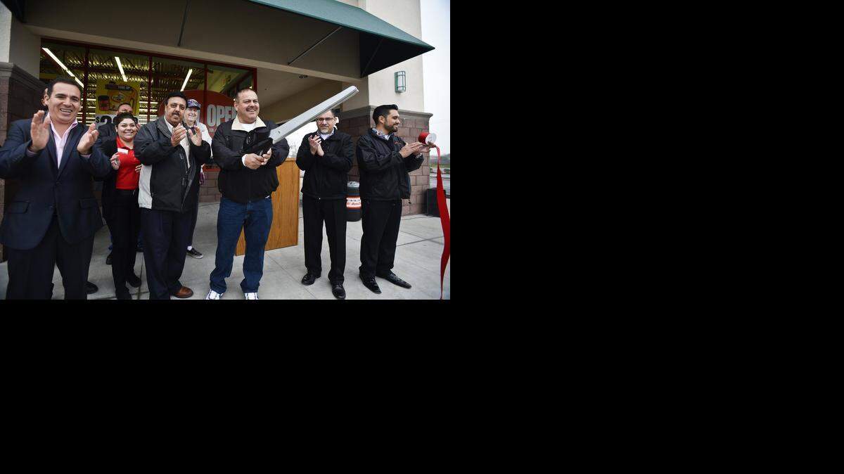 
Livingston Mayor Rodrigo Espinoza and Mayor Pro Tem Gurpal Samra cut a ribbon during a ceremony Tuesday for the new AutoZone, located at the intersection of B Street and Winton Parkway in Livingston. This is the first AutoZone location to appear in the city.

