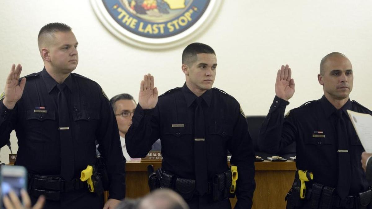 From left, T.J. Griffin, Joe Thornburg and Eddie Jimenez take an oath while becoming the three newest police officers in Livingston on Tuesday, Feb. 7, 2017, in the council chambers. The department now has 20 officers, according to Chief Ruben Chavez.