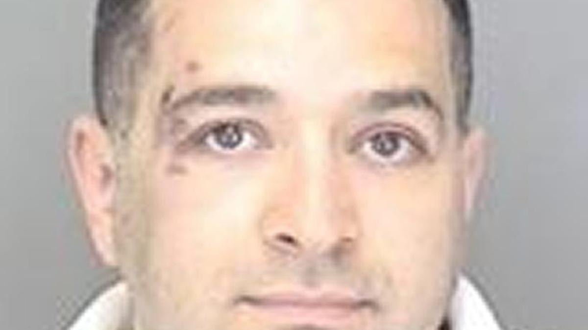 Injuries to Dwight Larks’ face are visible in his May 21, 2012, booking photo.