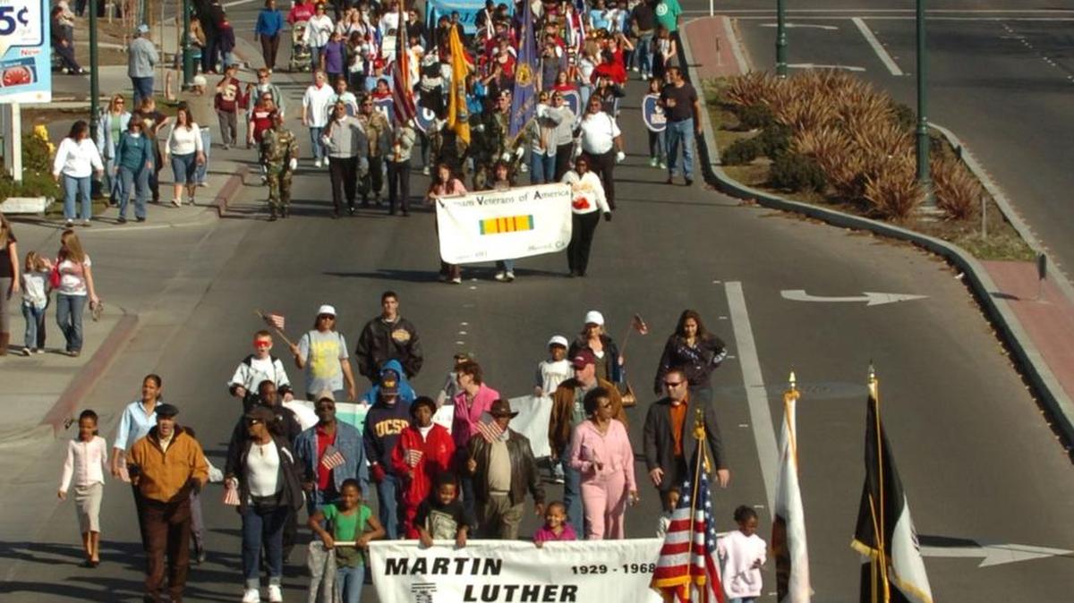 Citizens of Merced marching up Martin Luther King Jr. Boulevard, during the a celebration of King in 2009.
