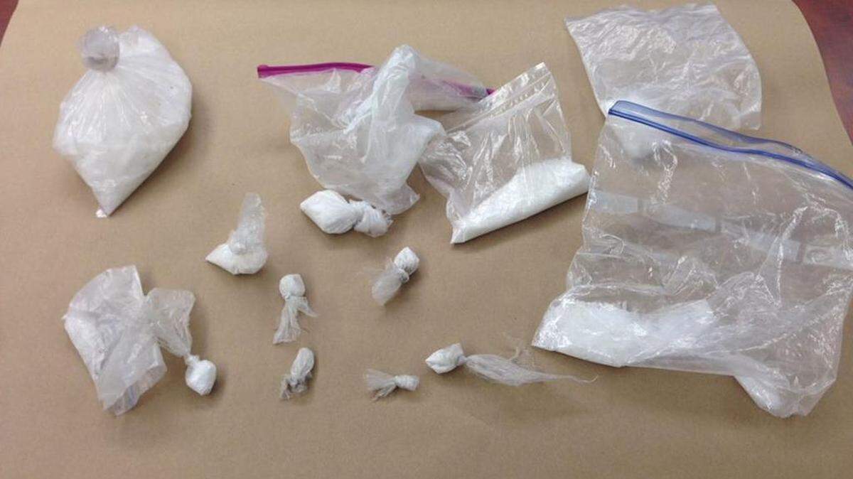Los Banos officers seized more than a pound crystal methamphetamine and more than $2,000 in searches on Thursday, Dec. 21, 2017, police said.