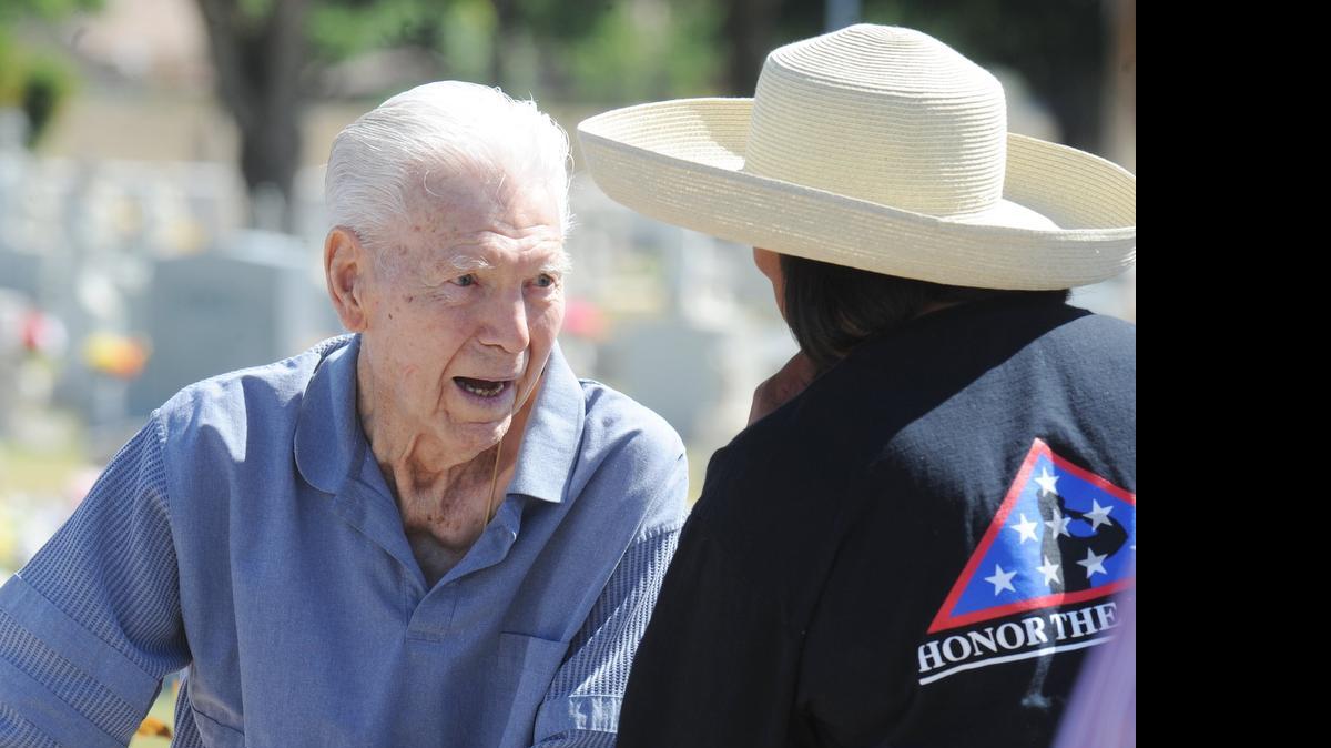 
Gus Villalta chats with Los Banos City Councilwoman Deborah Lewis at last year’s Memorial Day ceremony at the Los Banos District Cemetery. Villalta died Tuesday at 98.
