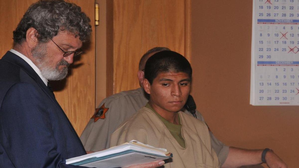 
Fabian Roman, 17, stands next to his attorney William Davis on Wednesday. The teen pleaded no contest to the second-degree murder of Raymond Sevilla, 17, at Dos Amigos Park.
