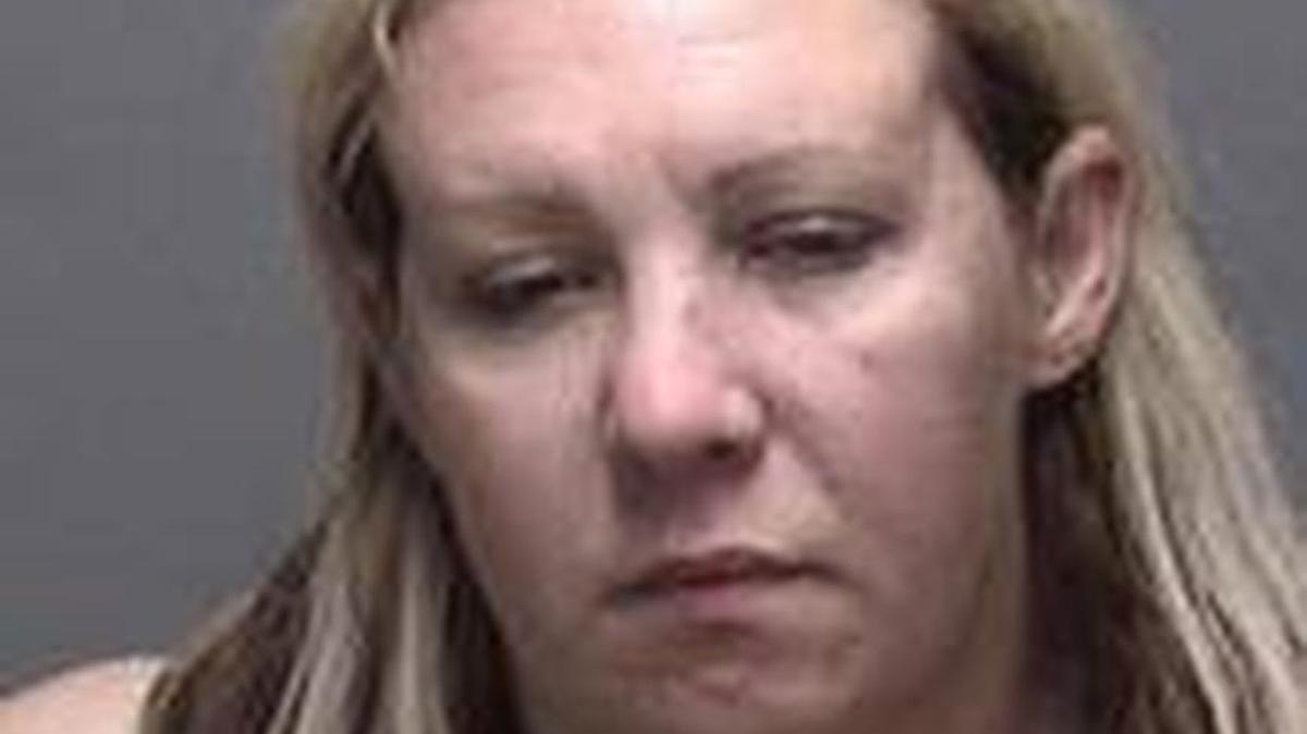 Amanda Burgess, 30, was arrested on suspicion of assault with a deadly weapon, officers said.