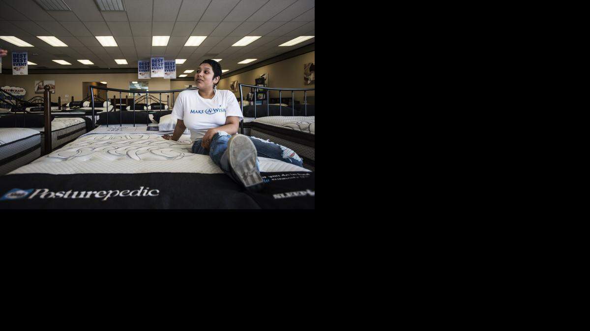
Alondra Hernandez, 17, of Merced, shops for a new bed at Sleep Train in Merced on Thursday. Hernandez, diagnosed with leukemia in 2014, has been sharing a bed with her younger sister.

