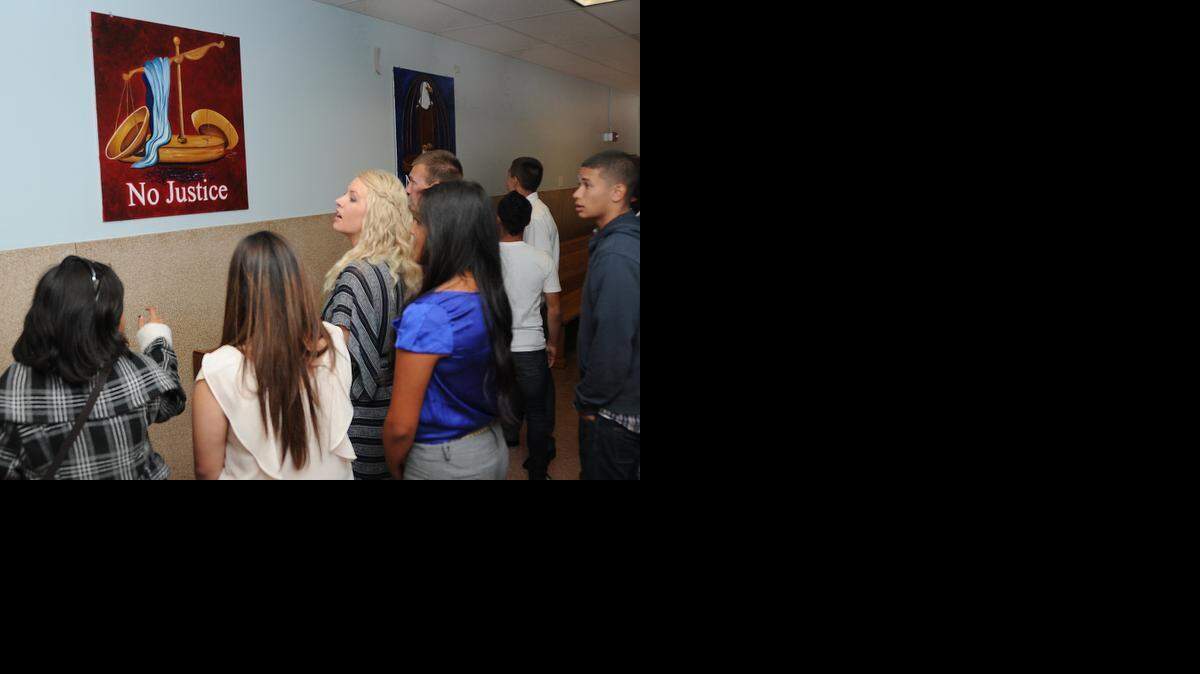 
Livingston High school art teacher Sarah Hill-Gremillion, center, takes her class to see the local artwork at Merced Superior Court in 2012.
