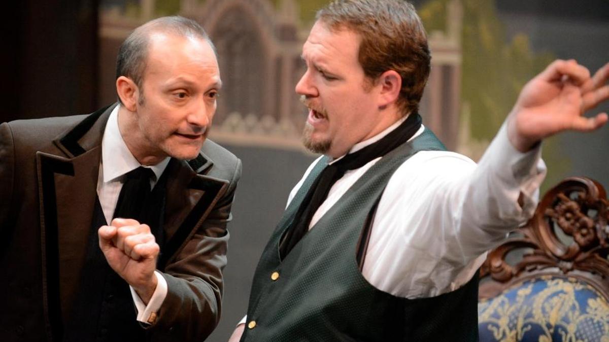 Colton Dennis plays Jack, left, grabbing for a cigarette case from Stephen Mouillesseaux as Algernon during a dress rehearsal of “The Importance of Being Earnest” at Playhouse Merced on Tuesday, Sept. 29, 2015.