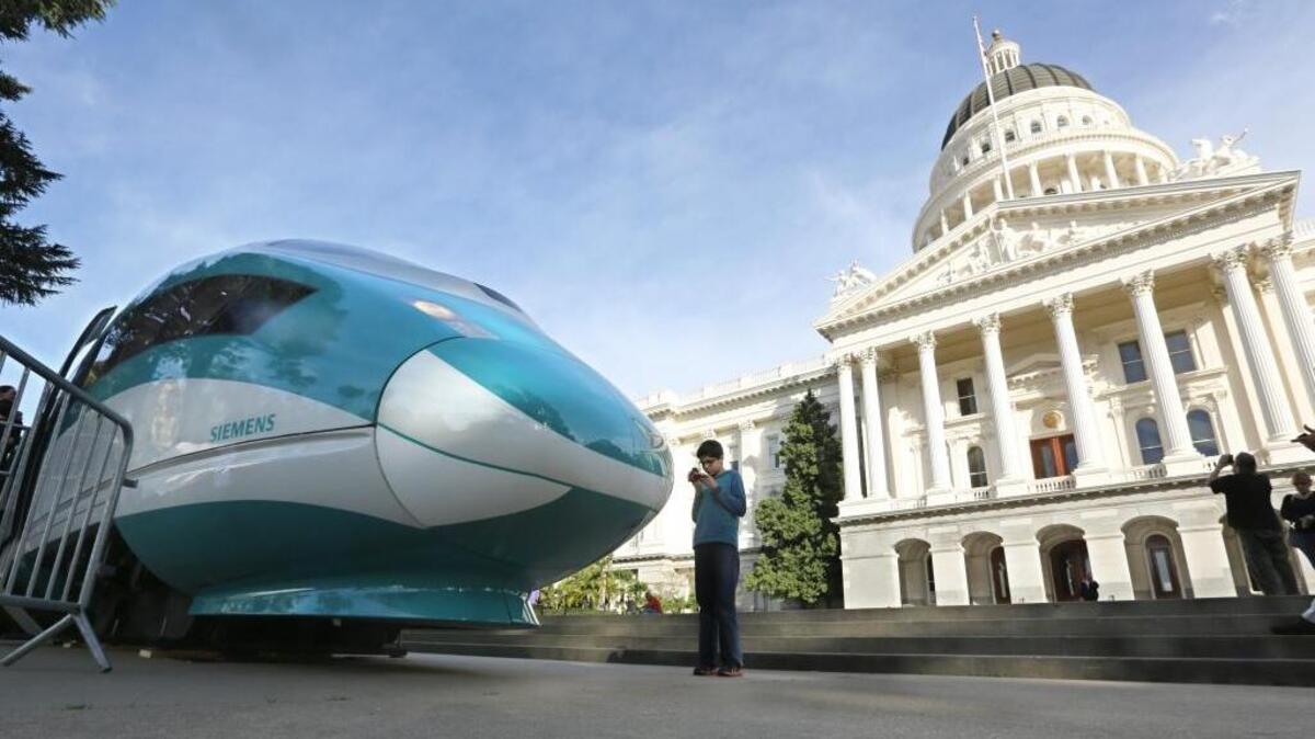 In this photo from February 2015, a full-scale mock-up of a high-speed train is displayed at the Capitol in Sacramento, Calif.