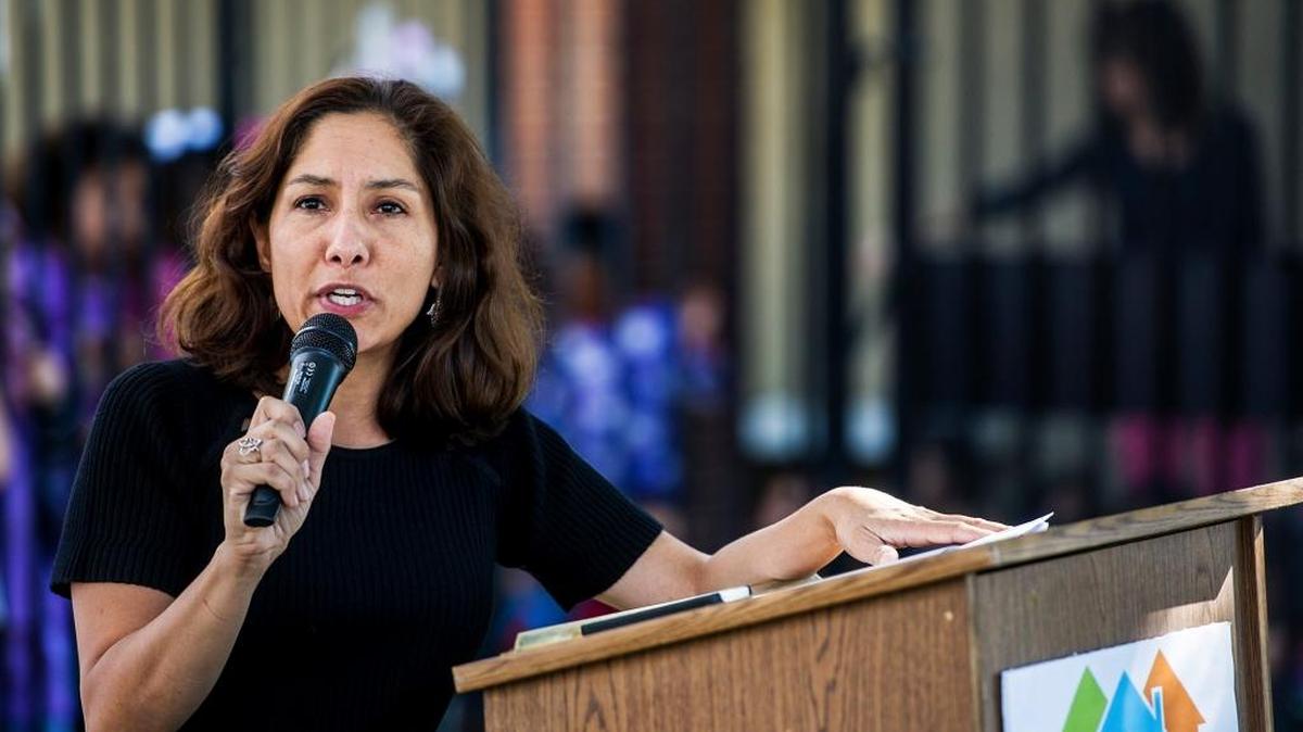 Hub Manager for Building Healthy Communities Tatiana Vizcaino-Stewart speaks to members of the community and media during a news conference announcing a $973,000 grant to improve sidewalks and streets around Franklin Elementary School in Merced, Calif., Wednesday, Oct. 28, 2015. She announced her intention to leave the Merced hub in the new year.
