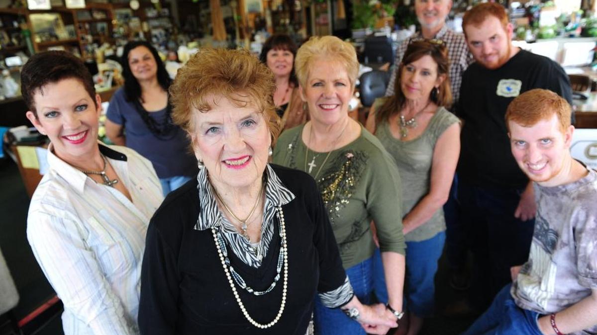 Roberta Flanagan, pictured in the center in 2012, was one of the first female realtors in the Merced County area. Pictured at the family’s Merced office with several family member.