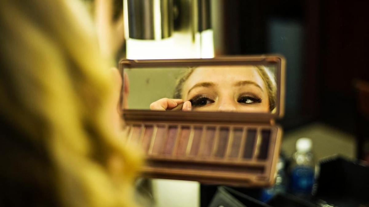 Kaylee Livria, 12, of Atwater, applies makeup in preparation for the Kaleidoscope Dance Performance Showcase at the Merced College Theater in Merced last year. The event which began more than 20 years ago, showcases some of the area’s best dance studios. Proceeds from the show will be used to fund scholarships for dance students.
