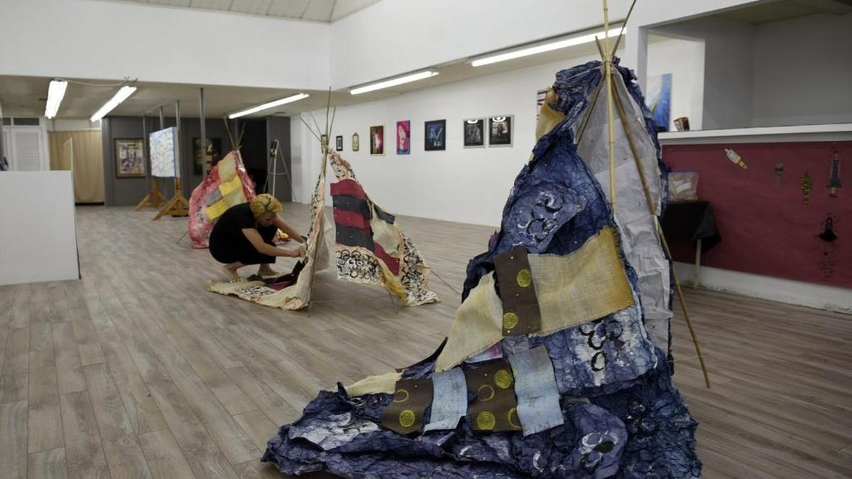 Kimberly Zamora, the co-founder of Merced Art Hop, works on a tipi-inspired piece inside the Epekel Gallery in Merced on Wednesday, July 13, 2016. Art Hop is 5-9 p.m. Saturday in downtown Merced.
