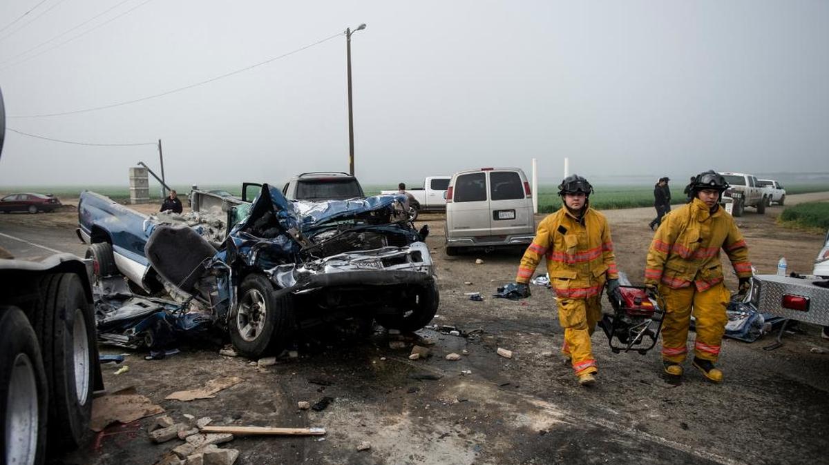 Emergency personnel respond to the scene of a crash, one of four involving a total of 16 vehicles on Highway 59 between Rahilly Road and East Sandy Mush Road in Merced County on Feb. 13.
